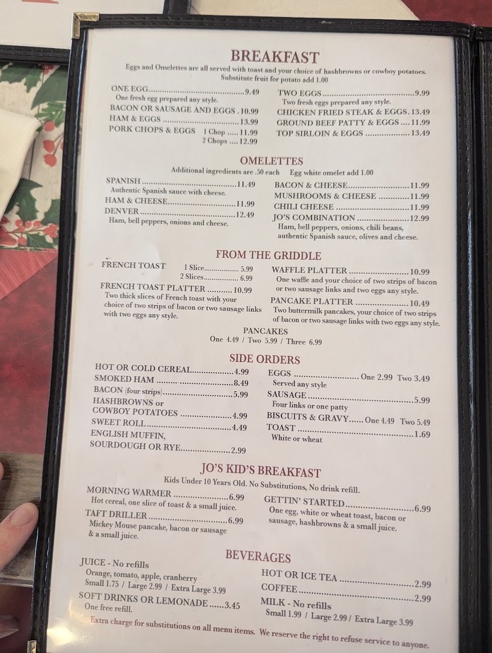 Menu board featuring homestyle breakfast and lunch items.